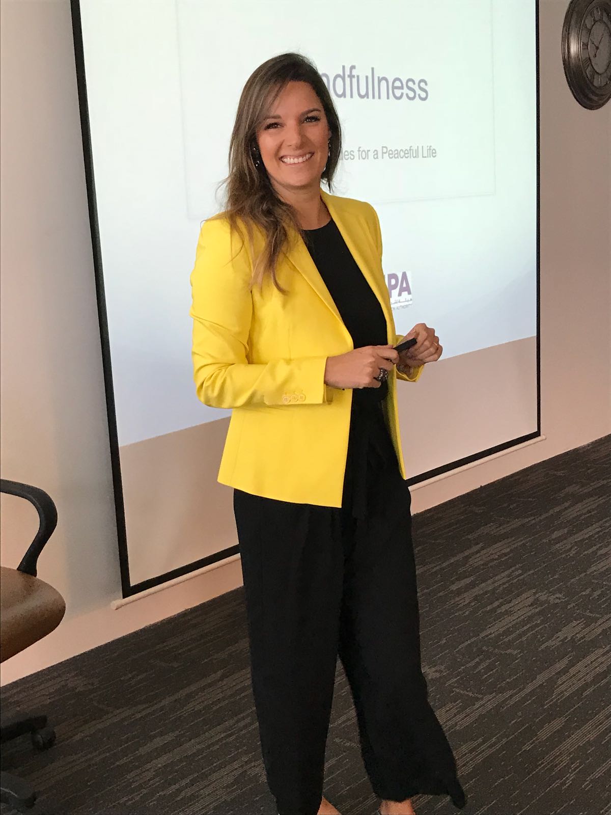 Fabiana speaking on stage